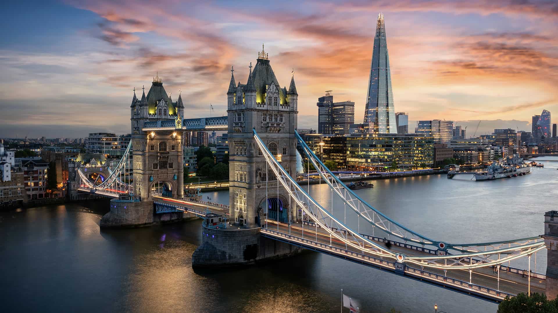 aerial-view-to-the-illuminated-tower-bridge-and-skyline-of-london-cover